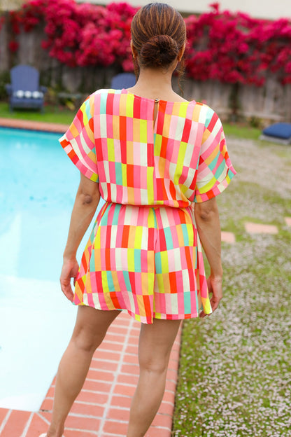 Eyes On You Coral Geo Abstract Surplice Woven Romper