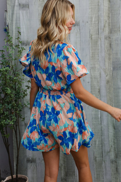 Feeling Bold Turquoise Floral Smocked Waist Flutter Sleeve Romper